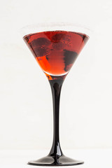 Red cocktail with raspberry