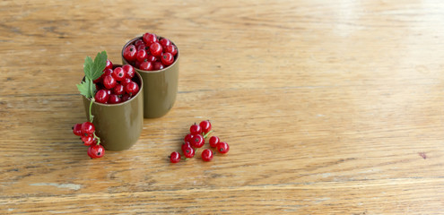 Red currants in green glasses