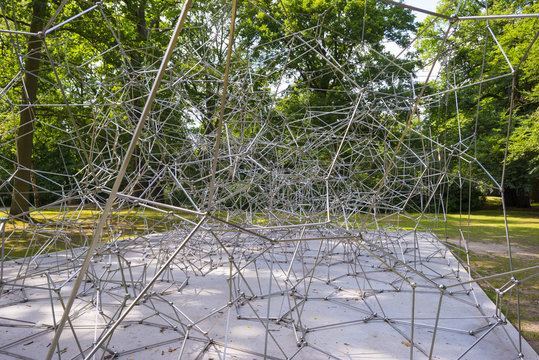 Steel construction in a forest in summer