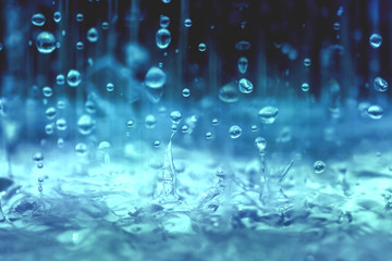 close up rain water drop falling to the floor in rainy season  - obrazy, fototapety, plakaty