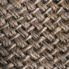 Hessian sackcloth woven texture pattern background in yellow beige cream sepia brown color