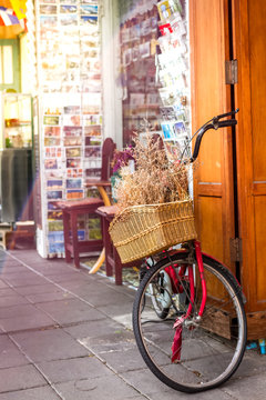 vintage bicycle in front of classic shop