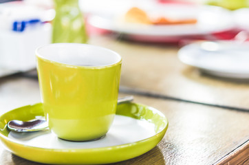 green cup of tea
