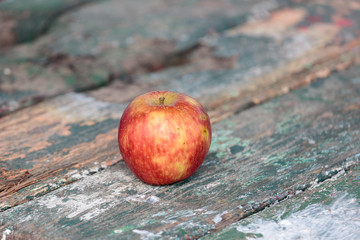 Red apple on desk