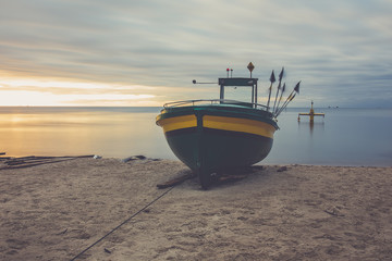 Fishing boat on the beach in Gdynia Orlowo. Poland