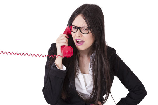 angry businesswoman with phone cord