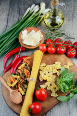 Different kinds of raw pasta on the table