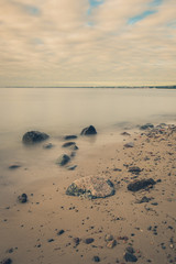 Sunrise over the sea. Beautiful long exposure landscape of rocky