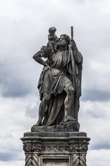 Fototapeta premium Statue on Charles Bridge (Karluv most, 1357). Prague, Czech Rep.