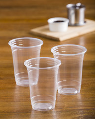 three cup of coffee on wood table