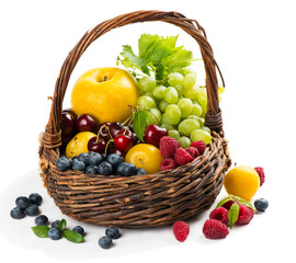   Assortment of fruits and berries in a basket