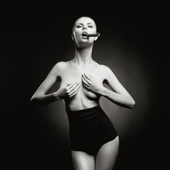 Gorgeous lady smokes