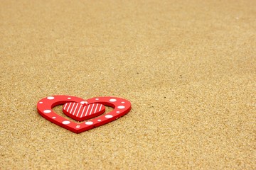 Single Wood Heart On The Sea Beach