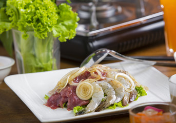 Vietnamese Traditional Food: hotpot with seafood ( shrimp, squid