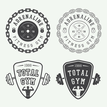 Set of gym logos, labels and badges in vintage style