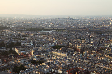 Summer evening view on Paris city from top, France