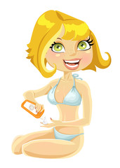 beautiful girl in swimsuit with a cream for sunburn