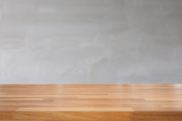 Empty wooden table over concrete wall  background.product displa
