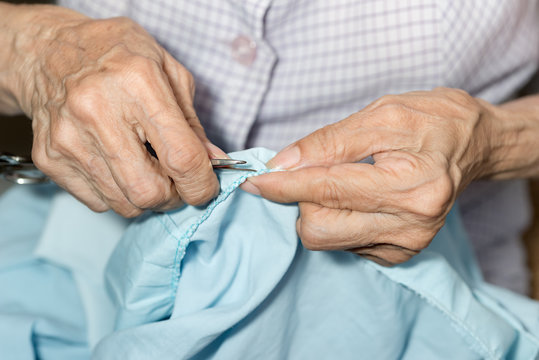 Elder sewing