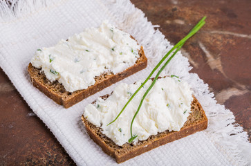 Healthy breakfast - homemade bread with goat cheese