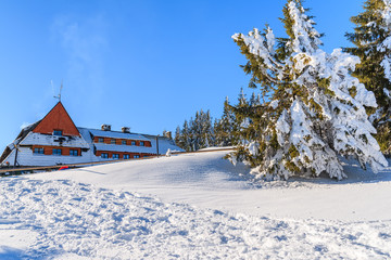 Turbacz shelter in winter scenery of Gorce Mountains, Poland