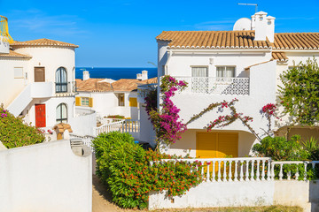 Fototapeta na wymiar Holiday houses in Luz town on coast of Portugal, Algarve region
