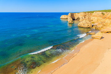 Obraz premium View of famous Marinha beach and rock cliffs from top, Algarve, Portugal