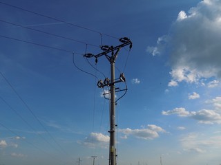 Power line column and sky