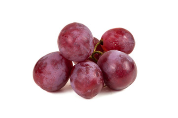 Bunch of red grapes on white background