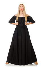 Fototapeta premium Tall woman in long black dress isolated on white