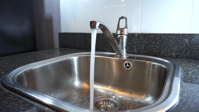 Running water from tab in to silver sink