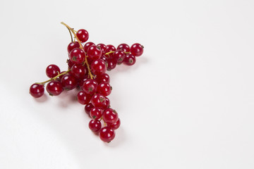 Some gooseberries on white background.