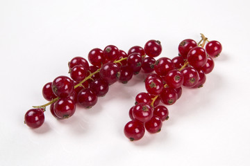 Some gooseberries on white background.