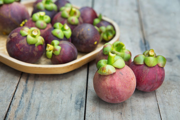 Mangosteen thai fruit on wood background