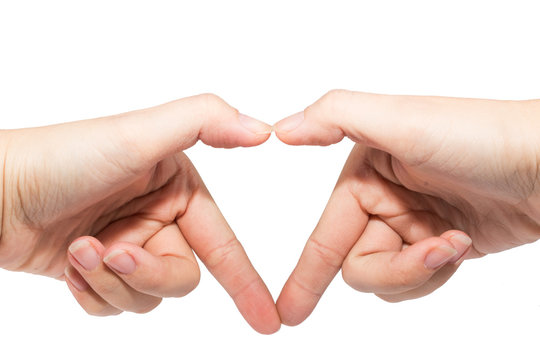 hands making a heart shape on a white isolated background
