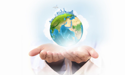 Globe in hands