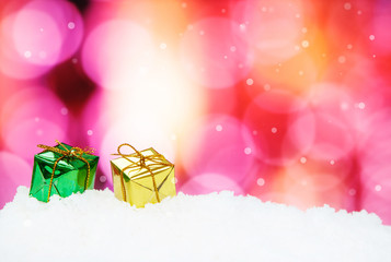 Gift Box and christmas decoration on abstract background and sno