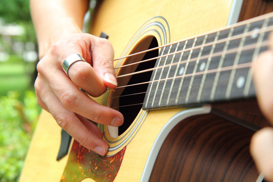 playing the guitar