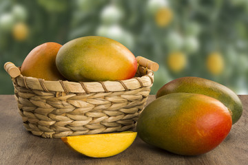 mango on a wood background.