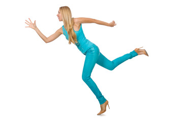 Fototapeta na wymiar Pretty blond woman in blue pants and shirt isolated on white