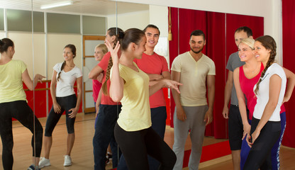 Fototapeta premium Young adults dancing in a studio