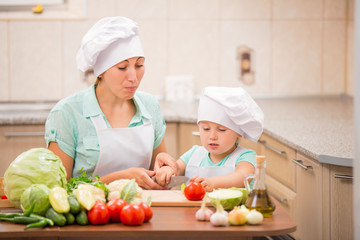 mother with her baby chefs