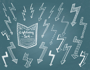 Set of hand drawn lightning on blue background.