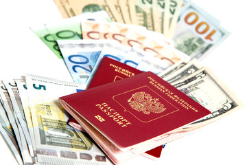 ,Российский паспорт и валюта на белом фоне.
