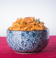 murukku or traditional indian snack on background.