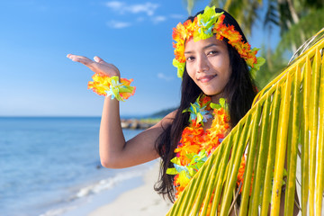 Hawaii hula dancers show her hand to the sky