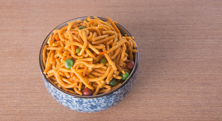 murukku or traditional indian snack on background.