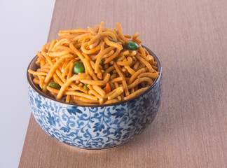 murukku or traditional indian snack on background.