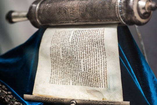 unwrapped Torah scroll silver