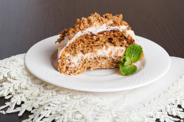 mini carrot cakes with cream of mascarpone and honey on the whit